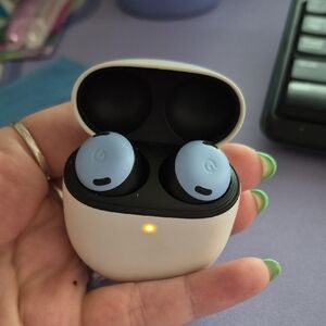 google Earbuds in Light Blue with White Charging Case